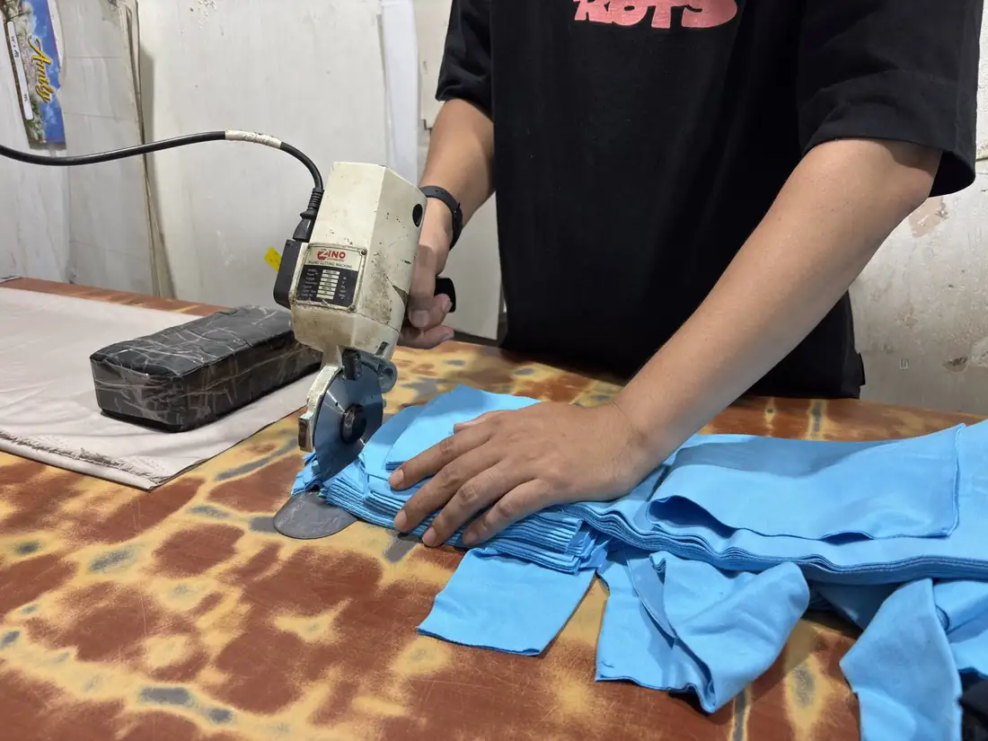 Proses cutting kain
